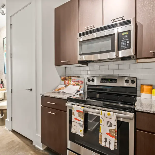 SYNC at West Midtown - A1sr Kitchen features "Subway Style" backsplash + Granite counters